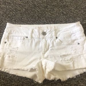American Eagle white distressed shorts
